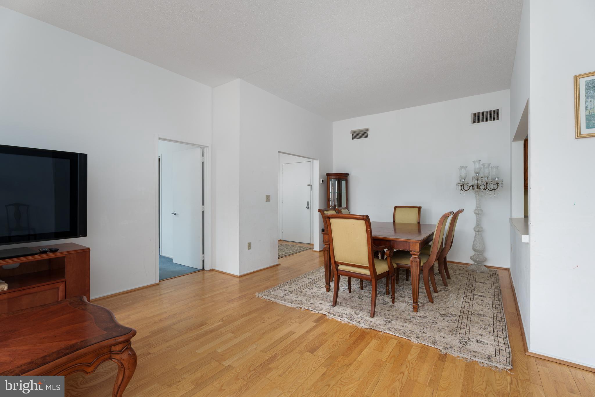 1 Markham Road, Unit 2C Princeton, NJ 08540 - Photo 4 of 23 a view of a dining room with furniture