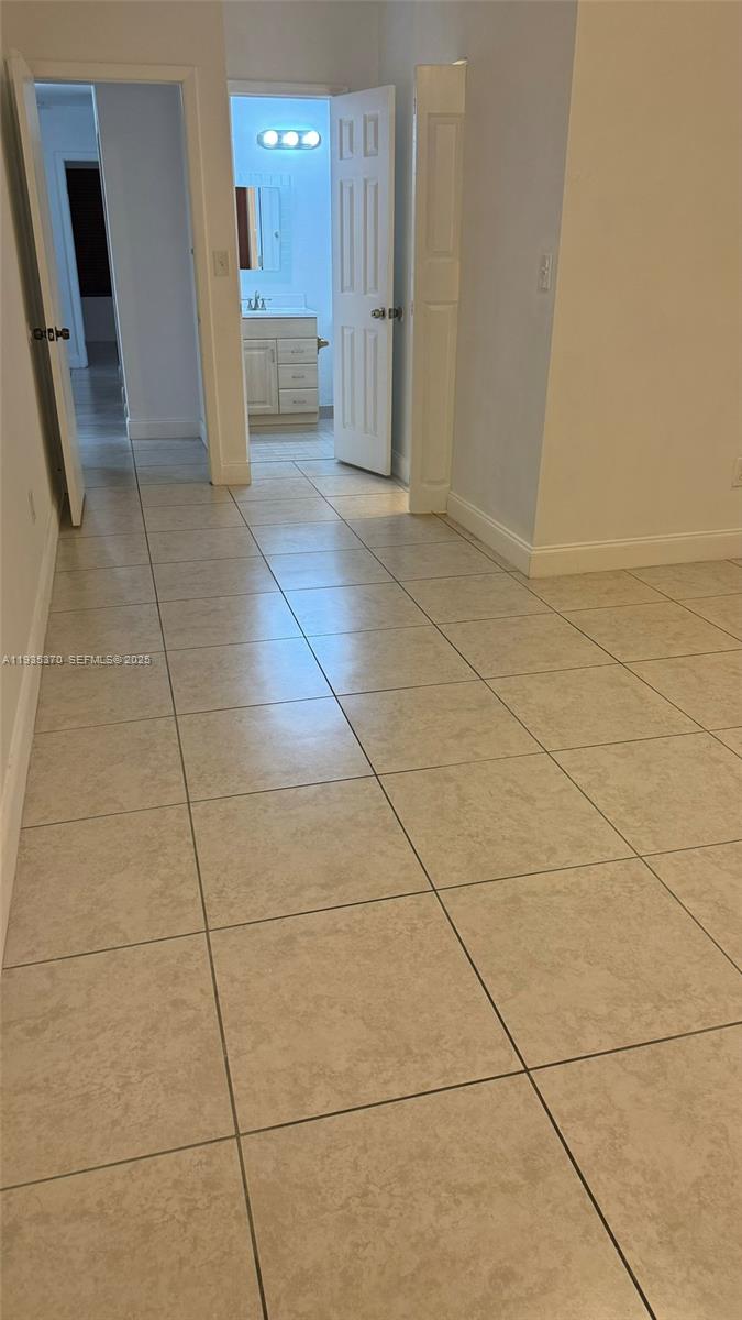 9636 Southwest 147th Court Miami, FL 33196 - Photo 21 of 37 a view of a kitchen with a sink
