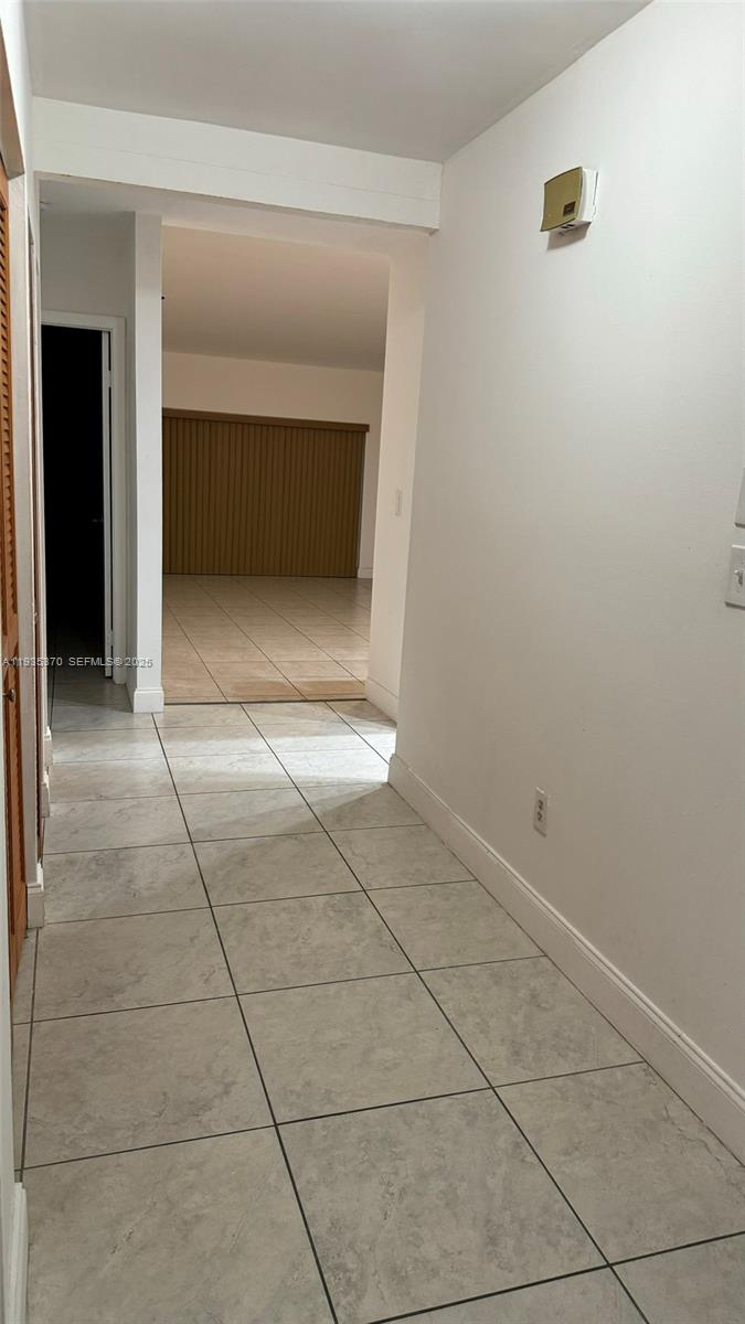 9636 Southwest 147th Court Miami, FL 33196 - Photo 30 of 37 a view of an empty room & window