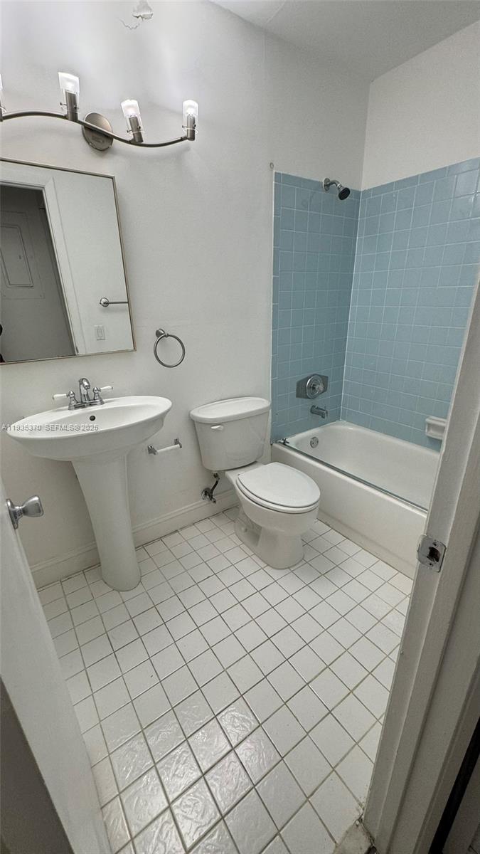 9636 Southwest 147th Court Miami, FL 33196 - Photo 33 of 37 a bathroom with a toilet and a sink