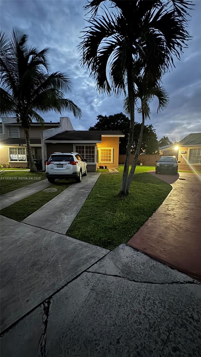 9636 Southwest 147th Court Miami, FL 33196 - Photo 36 of 37 a view of a house with a yard