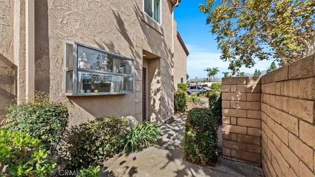 a view of a pathway along the building