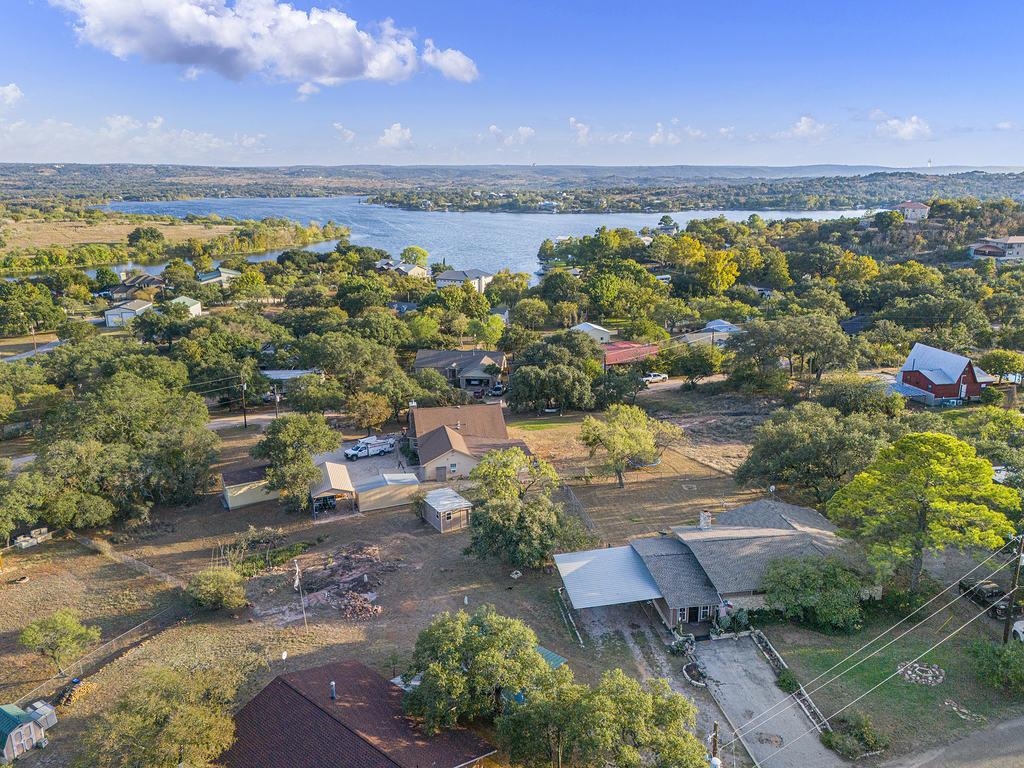 104 Rio Vista Road Burnet, TX 78611 - Photo 26 of 30 an aerial view of a city with lots of residential buildings ocean and mountain view in back