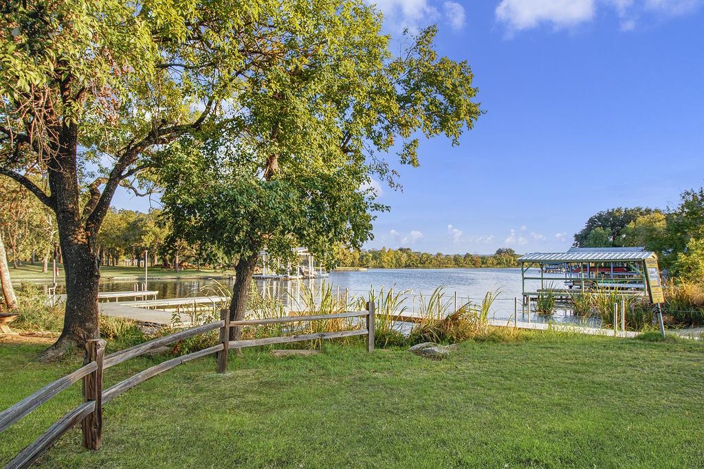 104 Rio Vista Road Burnet, TX 78611 - Photo 28 of 30 a garden with wooden fence