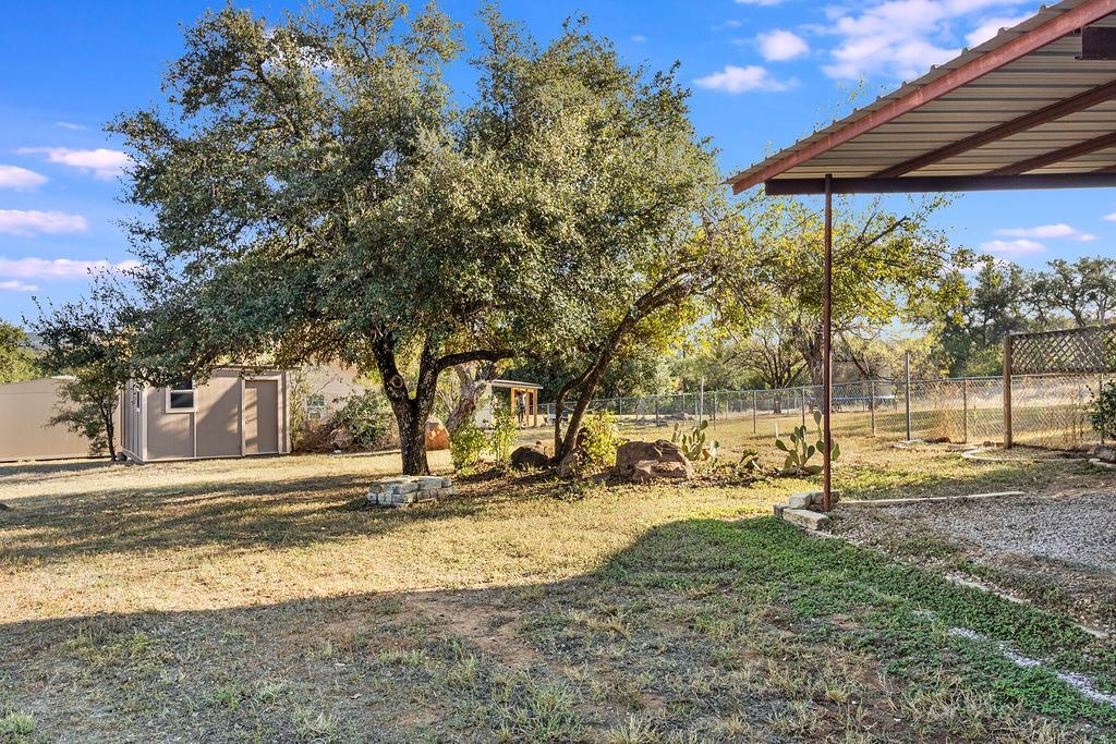 104 Rio Vista Road Burnet, TX 78611 - Photo 7 of 30 a view of yard with tree