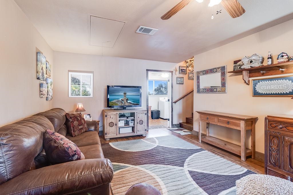 104 Rio Vista Road Burnet, TX 78611 - Photo 9 of 30 a living room with furniture and a fireplace