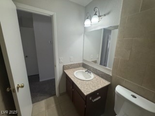 4360 Twin View Circle, Unit 4 Las Vegas, NV 89121 - Photo 8 of 17 Bathroom featuring vanity and light tile patterned floors