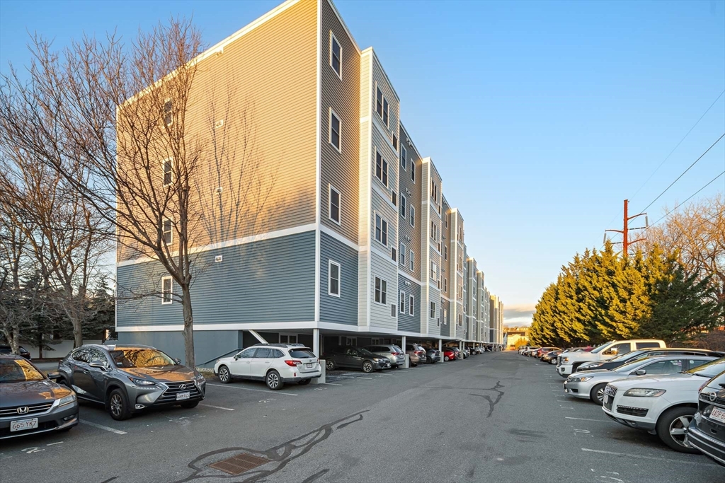 30 Franklin Street, Unit 124 Malden, MA 02148 - Photo 22 of 23 a view of cars parked in front of a building