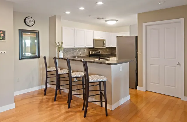a view of a dining room with furniture