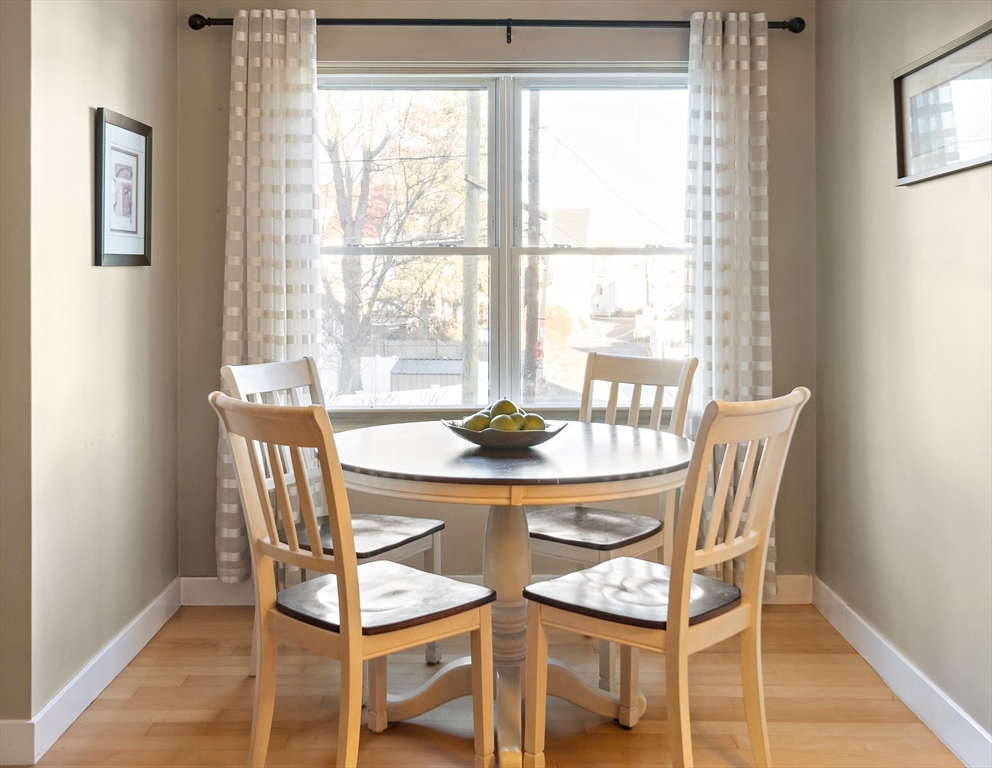 30 Franklin Street, Unit 124 Malden, MA 02148 - Photo 9 of 23 a dining room with furniture and window