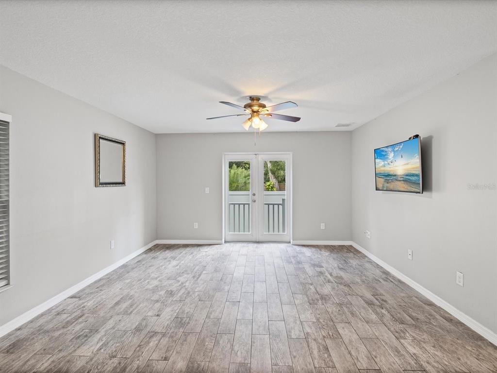 1238 Vista Way Clearwater, FL 33755 - Photo 18 of 32 a view of an empty room with a window