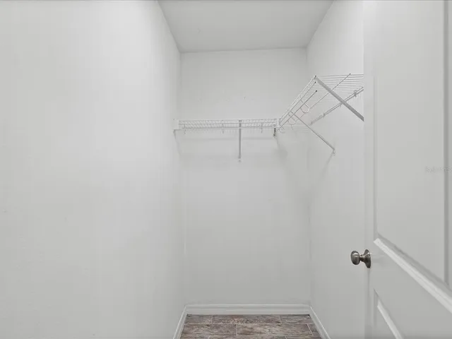 a view of a room with racks on the wall