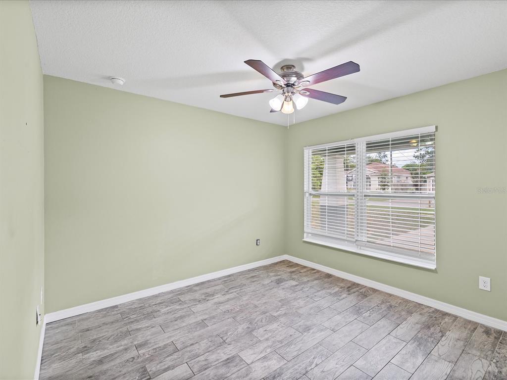 1238 Vista Way Clearwater, FL 33755 - Photo 7 of 32 a view of an empty room with a window
