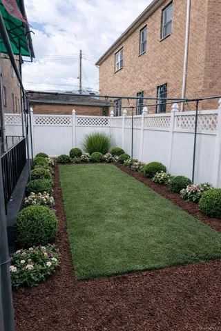 a view of a backyard with plants
