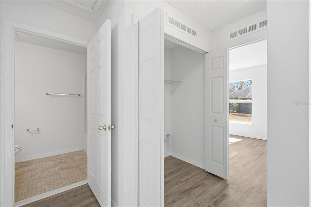 80 Providence Lane Palm Coast, FL 32164 - Photo 19 of 42 a view of a bathroom with wooden floor