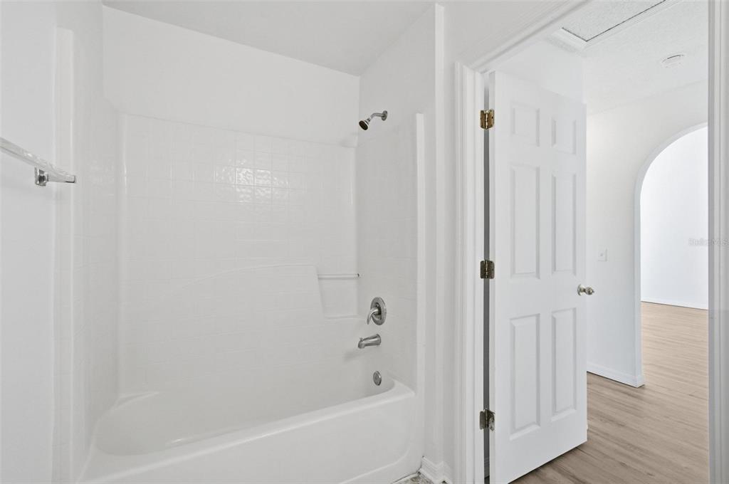 80 Providence Lane Palm Coast, FL 32164 - Photo 20 of 42 a bathroom with a bathtub