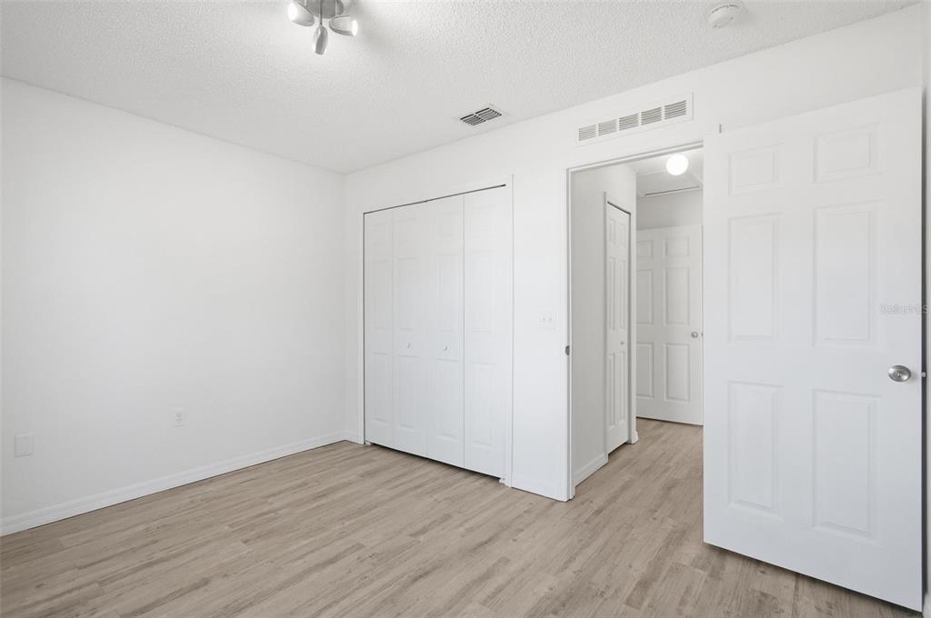 80 Providence Lane Palm Coast, FL 32164 - Photo 25 of 42 a view of an empty room