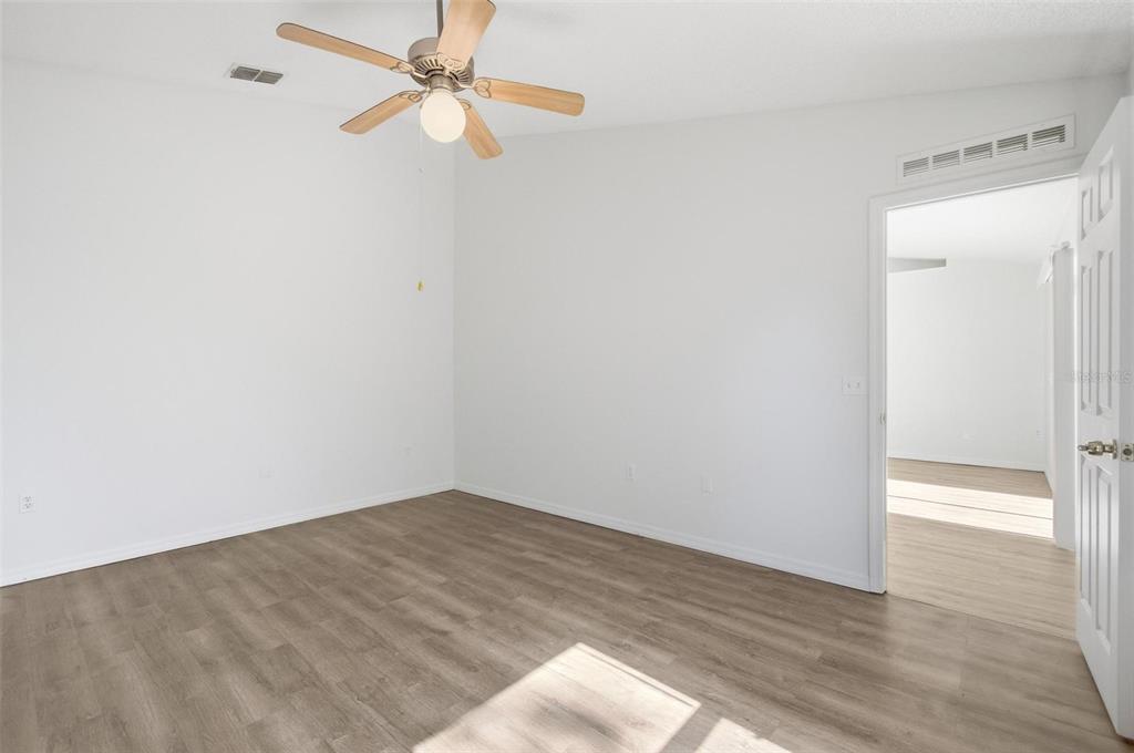 80 Providence Lane Palm Coast, FL 32164 - Photo 29 of 42 wooden floor in an empty room