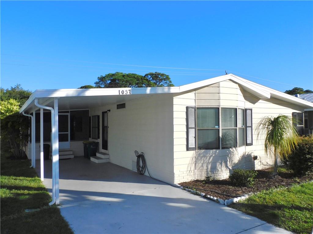 1037 Sebastian Road Barefoot Bay, FL 32976 - Photo 2 of 28