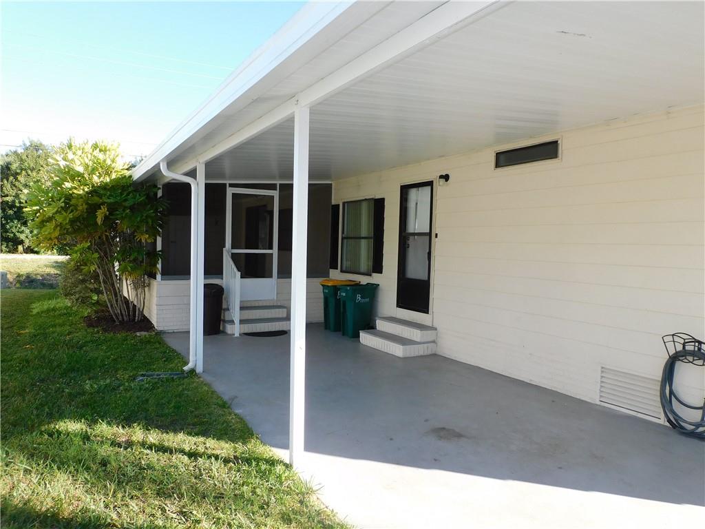 1037 Sebastian Road Barefoot Bay, FL 32976 - Photo 26 of 28