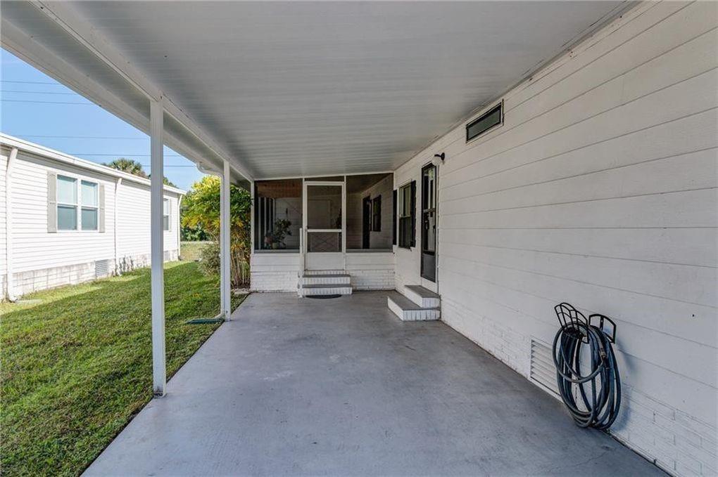1037 Sebastian Road Barefoot Bay, FL 32976 - Photo 3 of 28