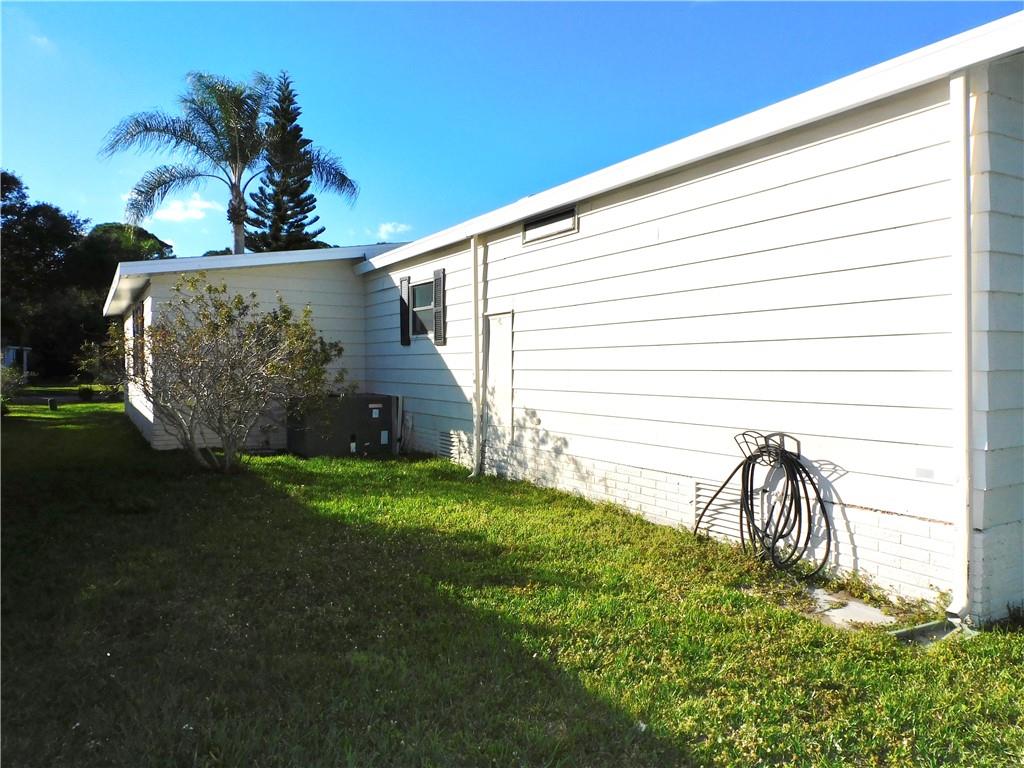 1037 Sebastian Road Barefoot Bay, FL 32976 - Photo 5 of 28