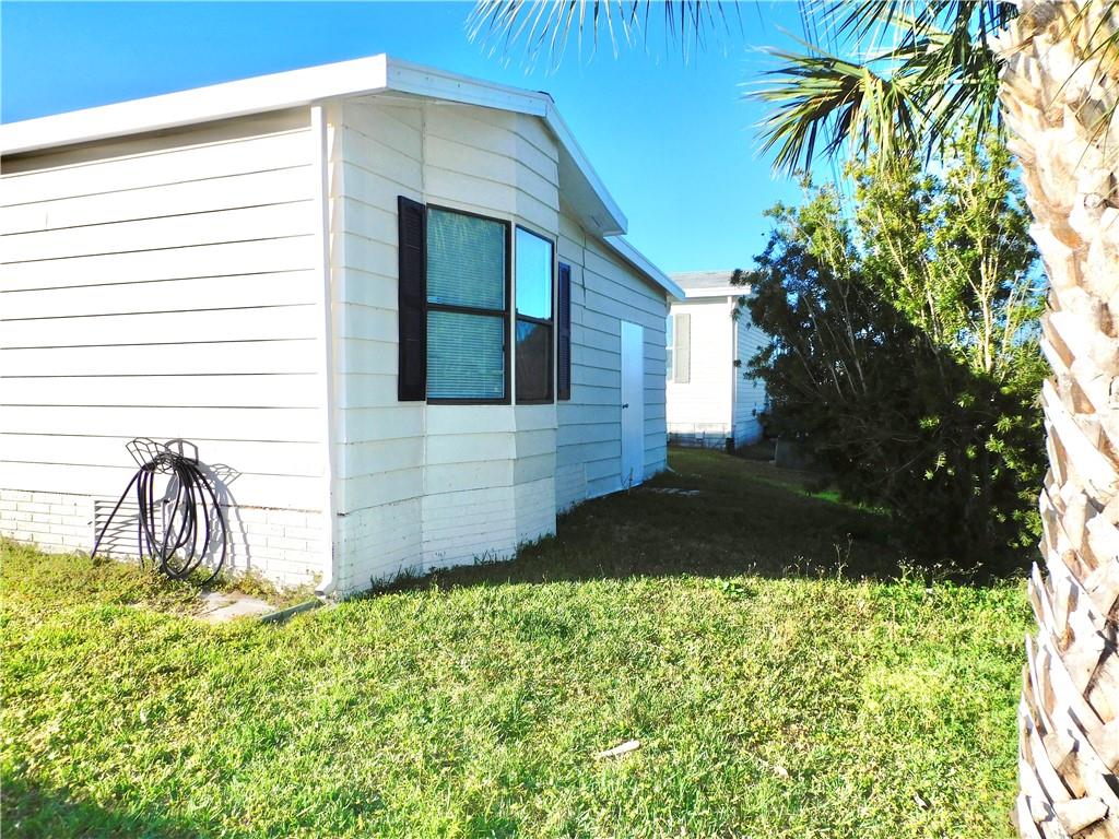 1037 Sebastian Road Barefoot Bay, FL 32976 - Photo 6 of 28