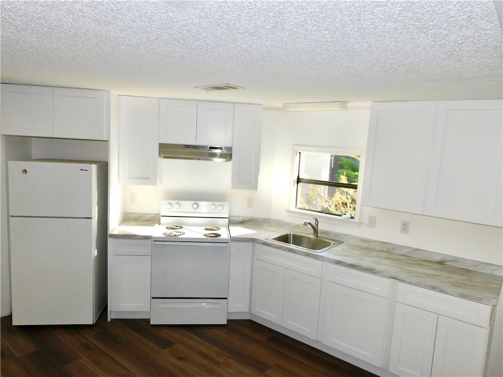 1037 Sebastian Road Barefoot Bay, FL 32976 - Photo 8 of 28