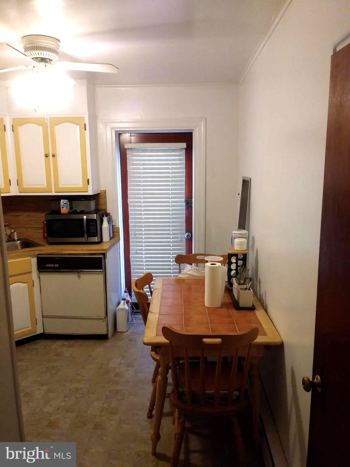 5222 Rising Sun Avenue Philadelphia, PA 19120 - Photo 10 of 27 First Floor Unit Kitchen Entrance