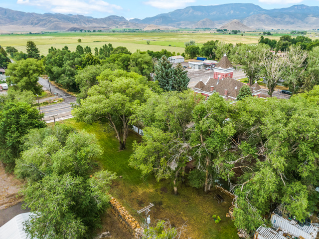 21 North Main Street Kingston, UT 84743 - Photo 98 of 107 Drone / aerial view of a mountainous background and a tree filled landscape