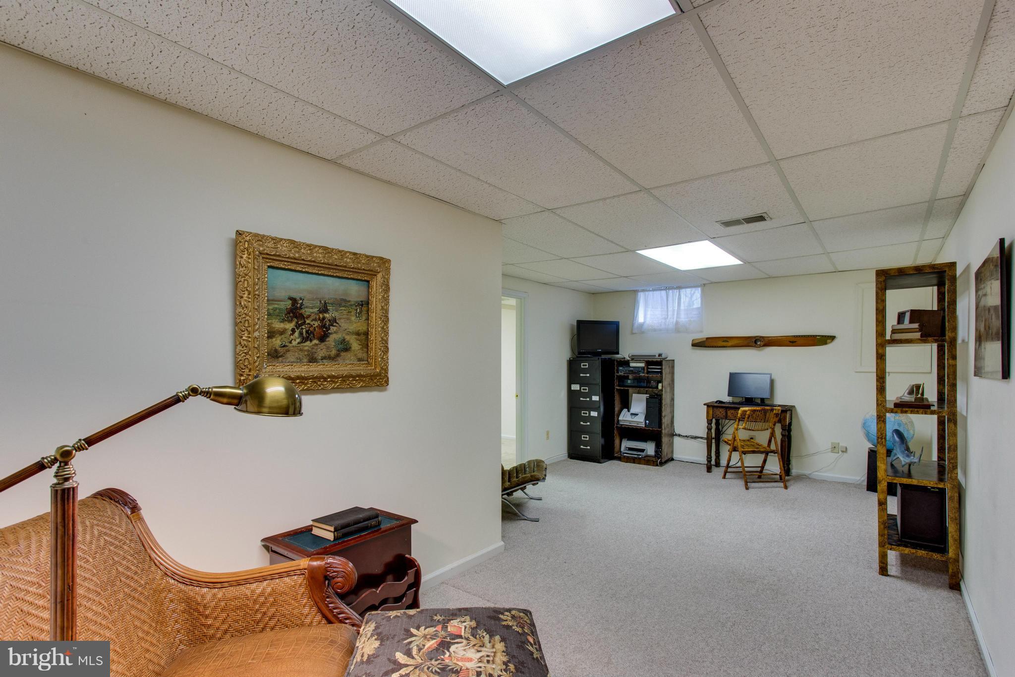 8230 Stacey Road Alexandria, VA 22308 - Photo 22 of 30 a view of a room with gym equipment