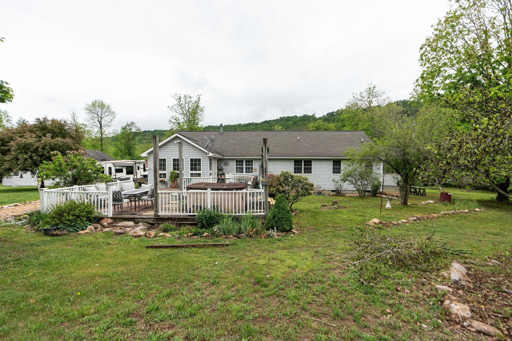 516 Estaline Valley Road Craigsville, VA 24430 - Photo 52 of 75 a house view with a garden space