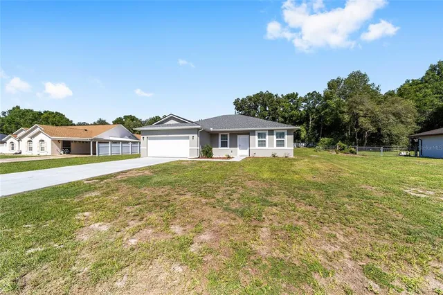 a house view with a garden space