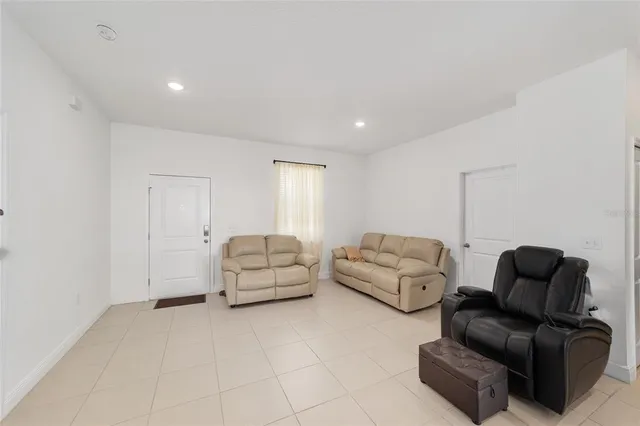 a living room with furniture and a couch