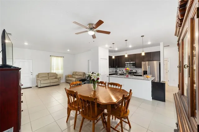 a view of a dining room kitchen and a window