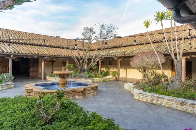 a view of a swimming pool with a terrace