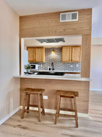 a room with a table and chairs