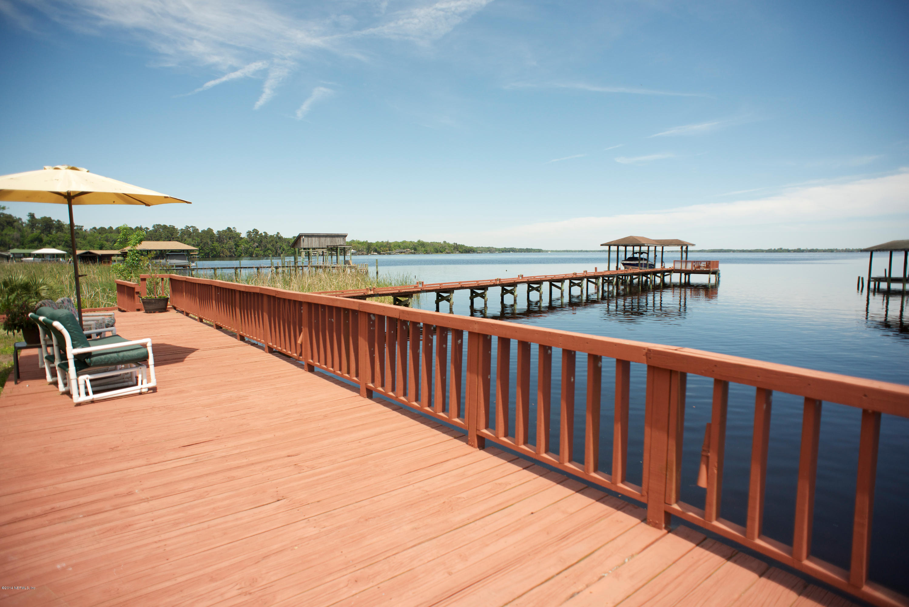 4109 Magnolia Road Orange Park, FL 32065 - Photo 19 of 32 a terrace with outdoor seating and barbeque oven