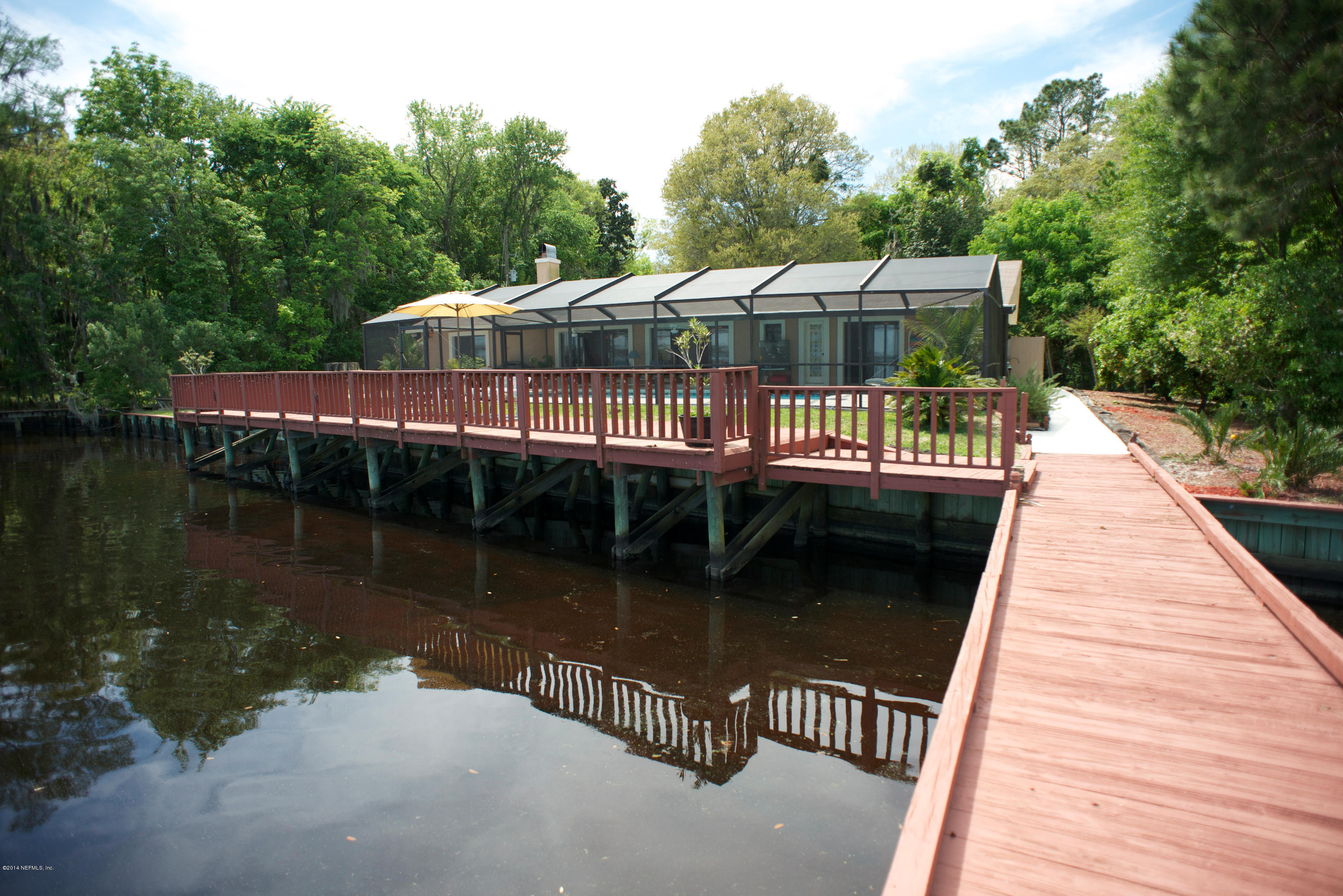 4109 Magnolia Road Orange Park, FL 32065 - Photo 24 of 32 a view of a house with pool