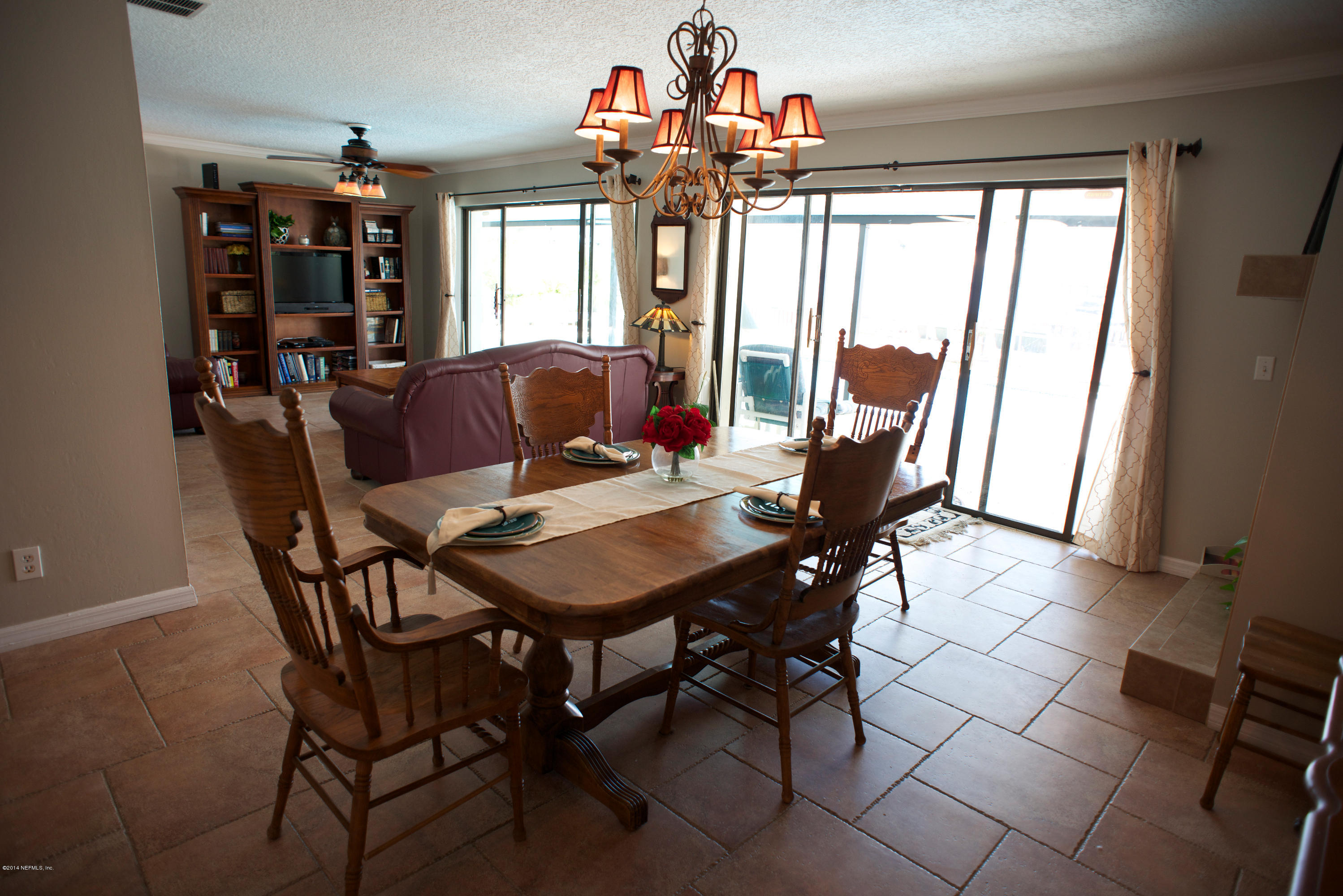 4109 Magnolia Road Orange Park, FL 32065 - Photo 5 of 32 a view of a dining room with furniture and window