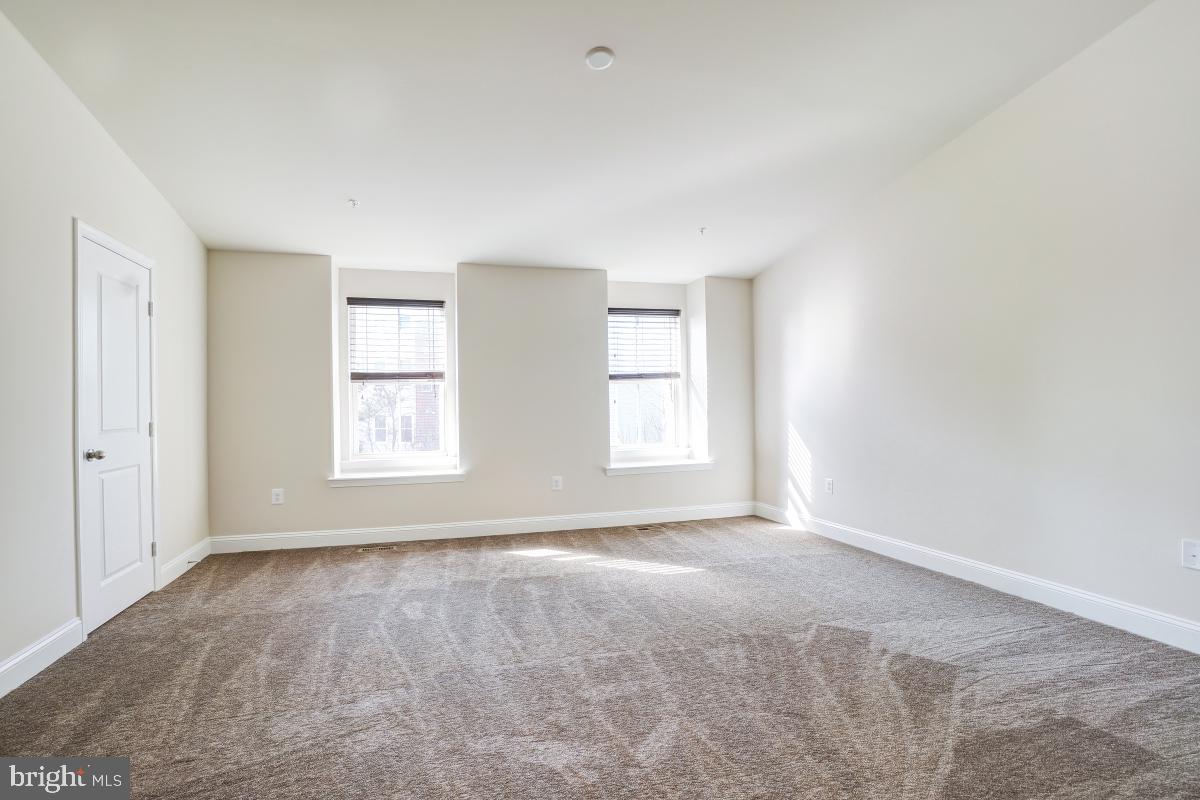 1709 Fieldstone Court Hanover, MD 21076 - Photo 19 of 30 an empty room with windows