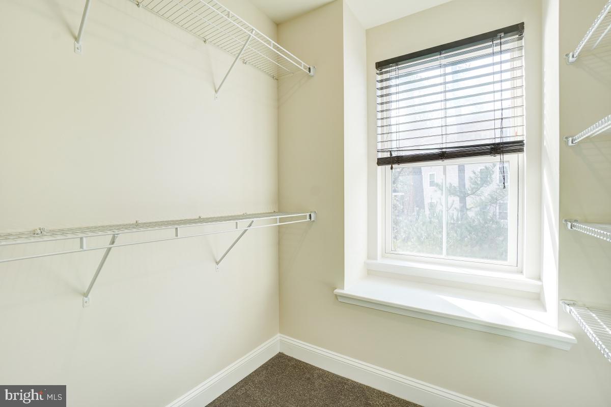 1709 Fieldstone Court Hanover, MD 21076 - Photo 22 of 30 a view of a small space with wooden floor and a window