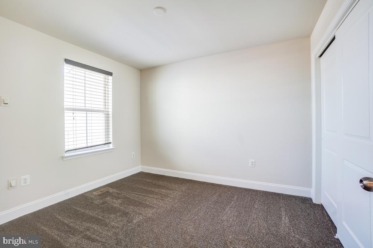 1709 Fieldstone Court Hanover, MD 21076 - Photo 25 of 30 an empty room with a window