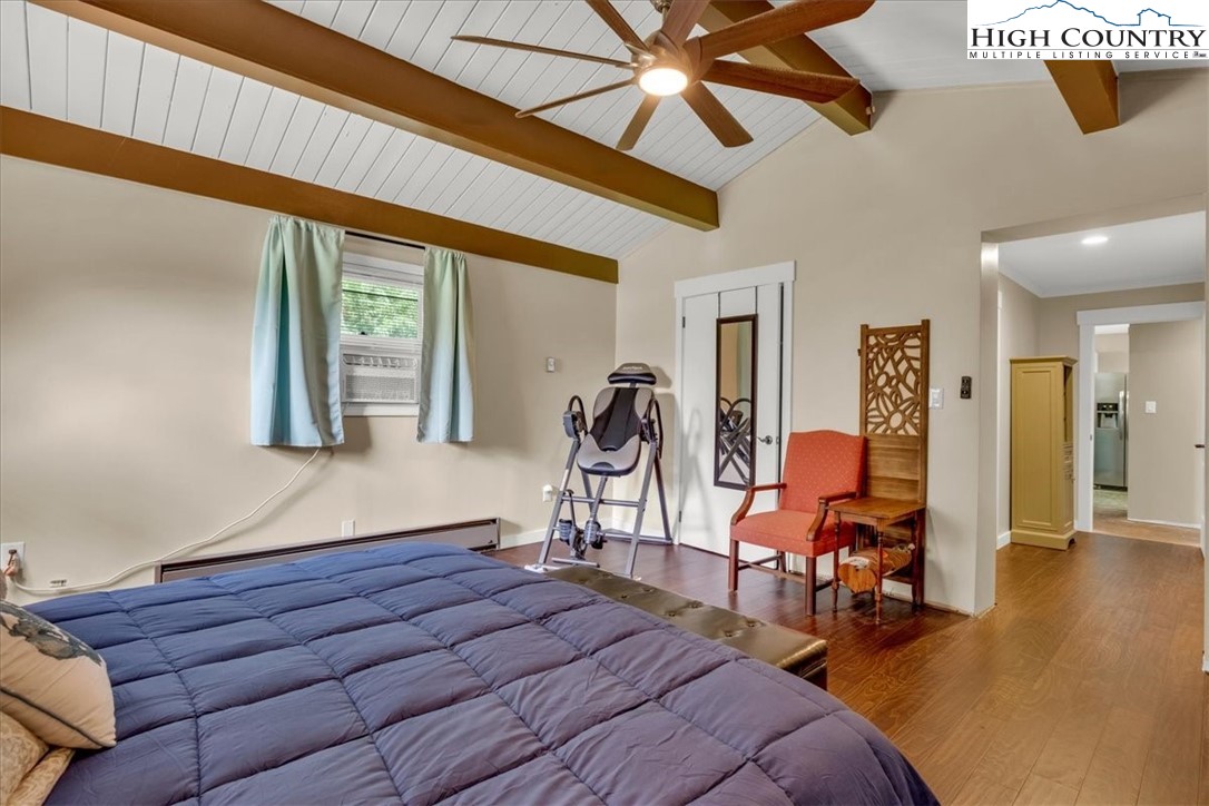 360 Fraser Road Sparta, NC 28675 - Photo 20 of 50 a bedroom with furniture and wooden floor