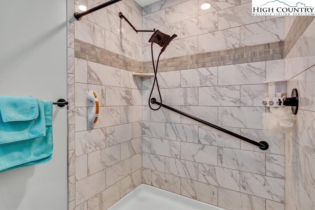 360 Fraser Road Sparta, NC 28675 - Photo 24 of 50 a bathroom with a shower