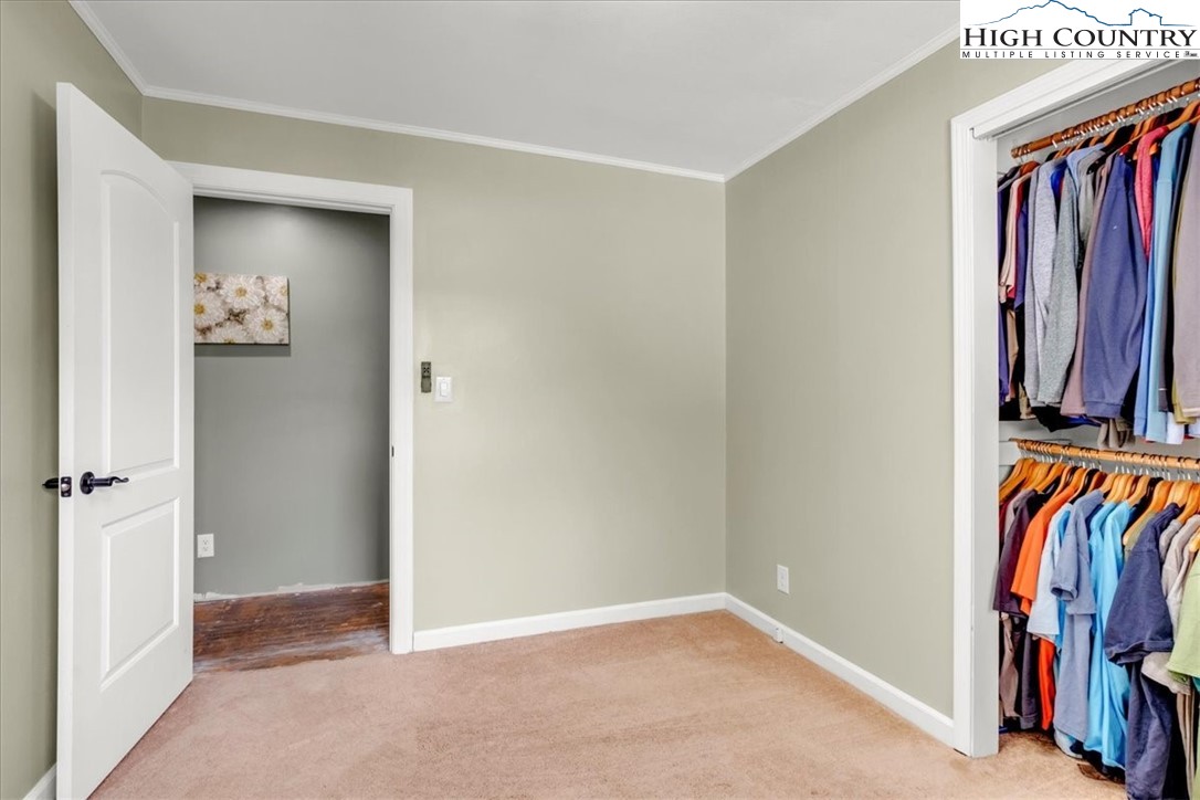 360 Fraser Road Sparta, NC 28675 - Photo 28 of 50 a view of walk in closet with clothes