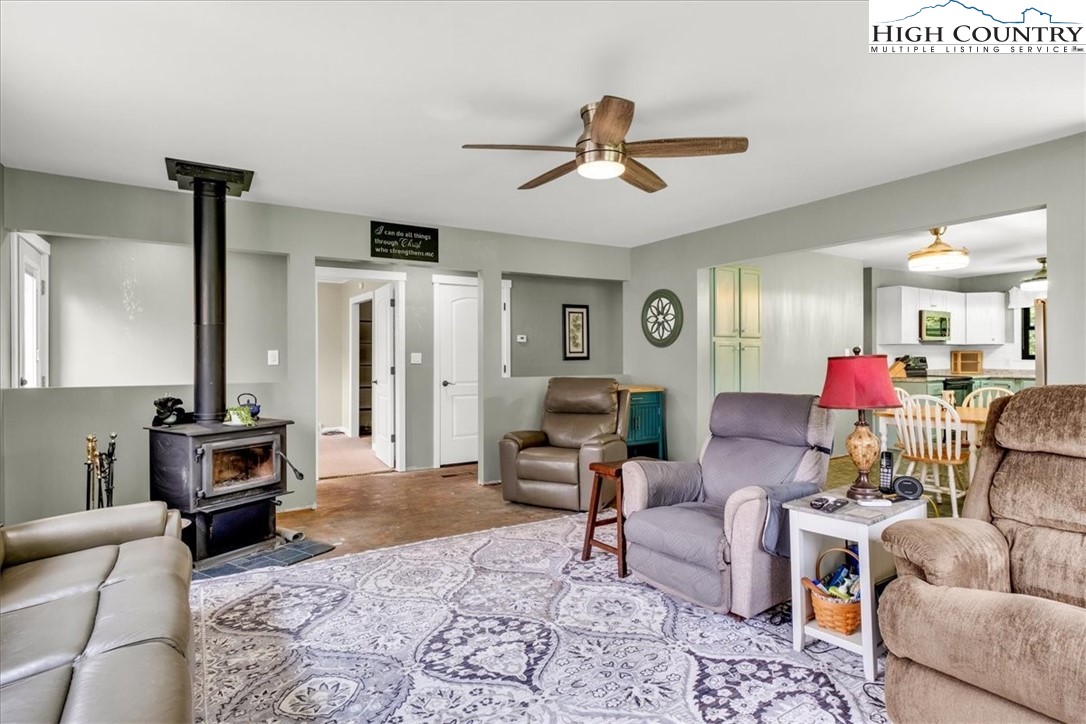 360 Fraser Road Sparta, NC 28675 - Photo 8 of 50 a living room with furniture and a flat screen tv