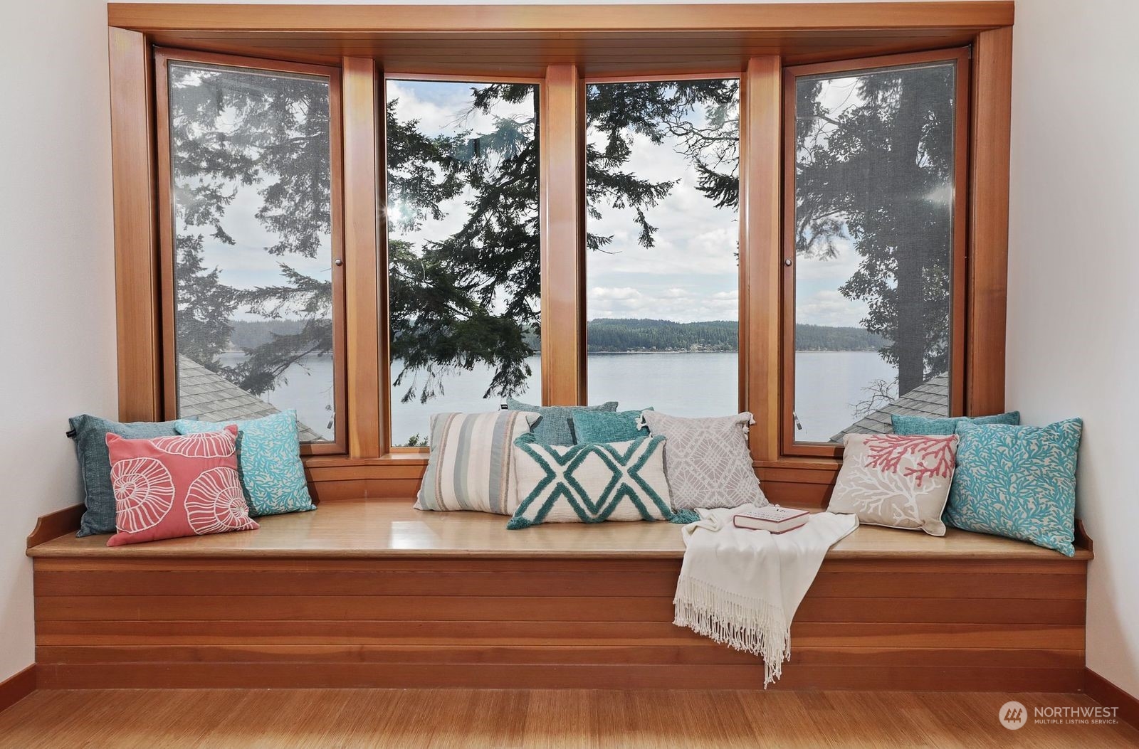 1292 Dines Point Road Greenbank, WA 98253 - Photo 25 of 40 a living room with furniture and large windows