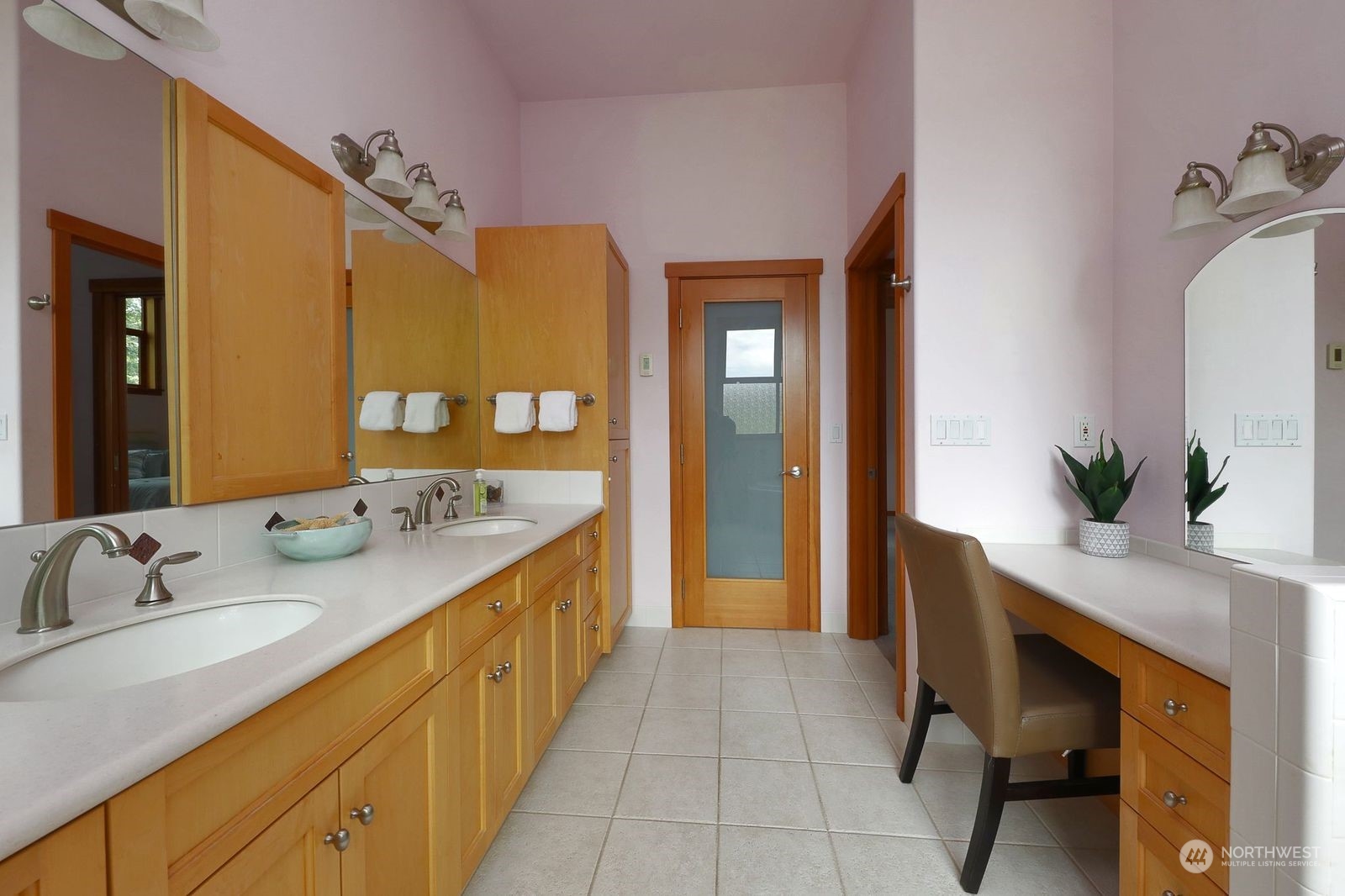 1292 Dines Point Road Greenbank, WA 98253 - Photo 30 of 40 a spacious bathroom with a granite countertop sink and a mirror