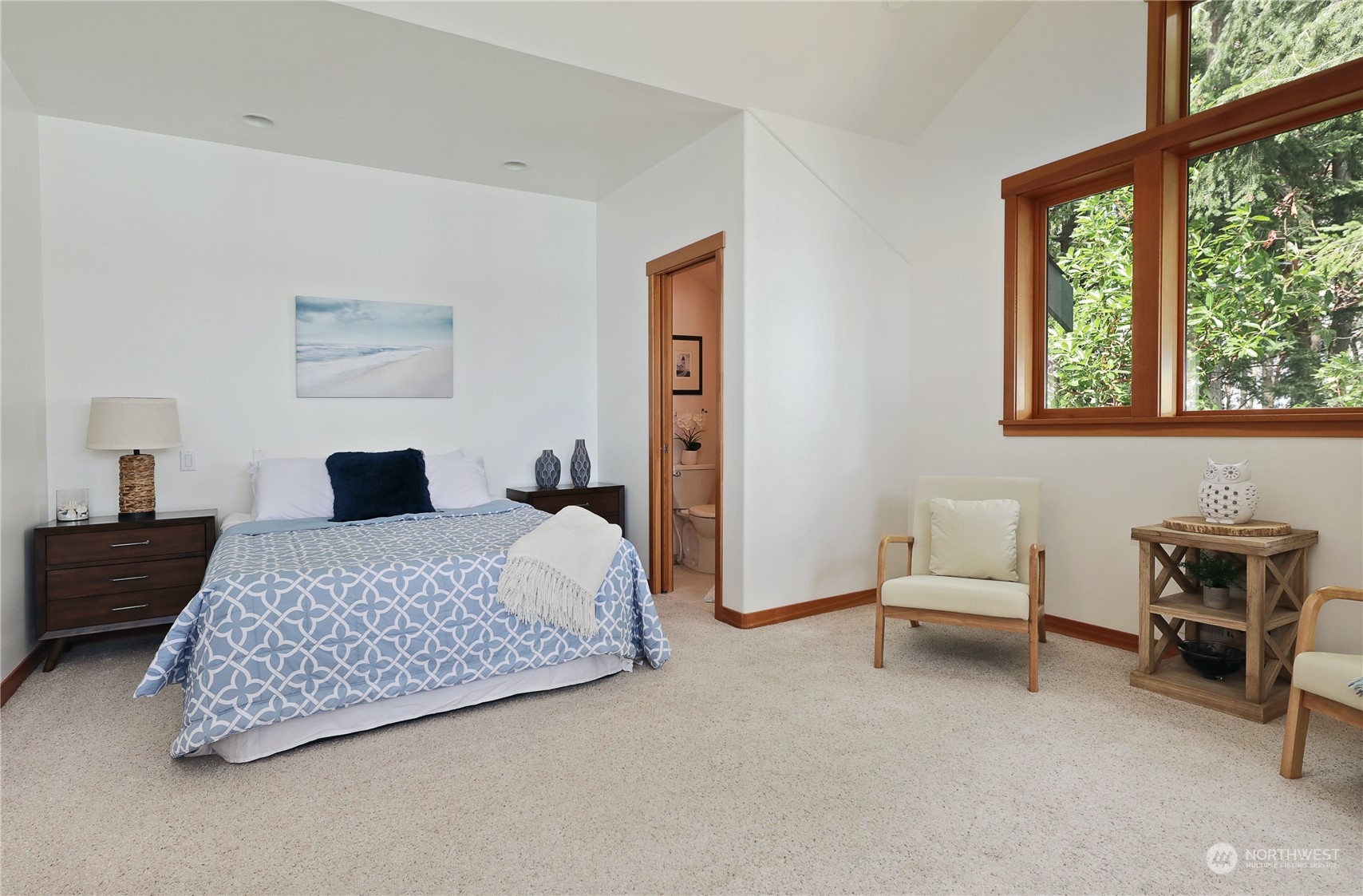 1292 Dines Point Road Greenbank, WA 98253 - Photo 31 of 40 a bedroom with a bed and a window